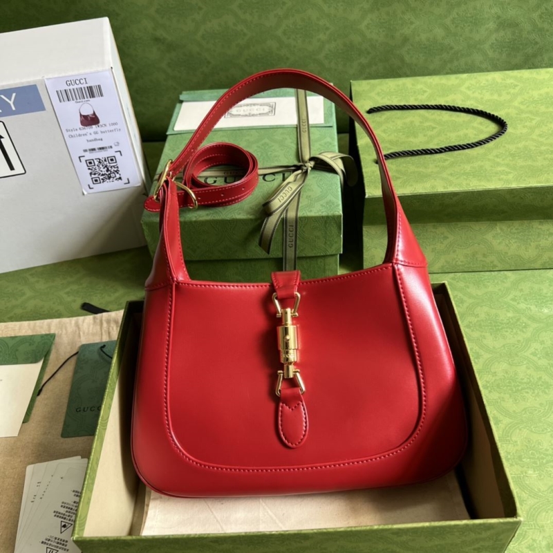 G*u*i top handle bags